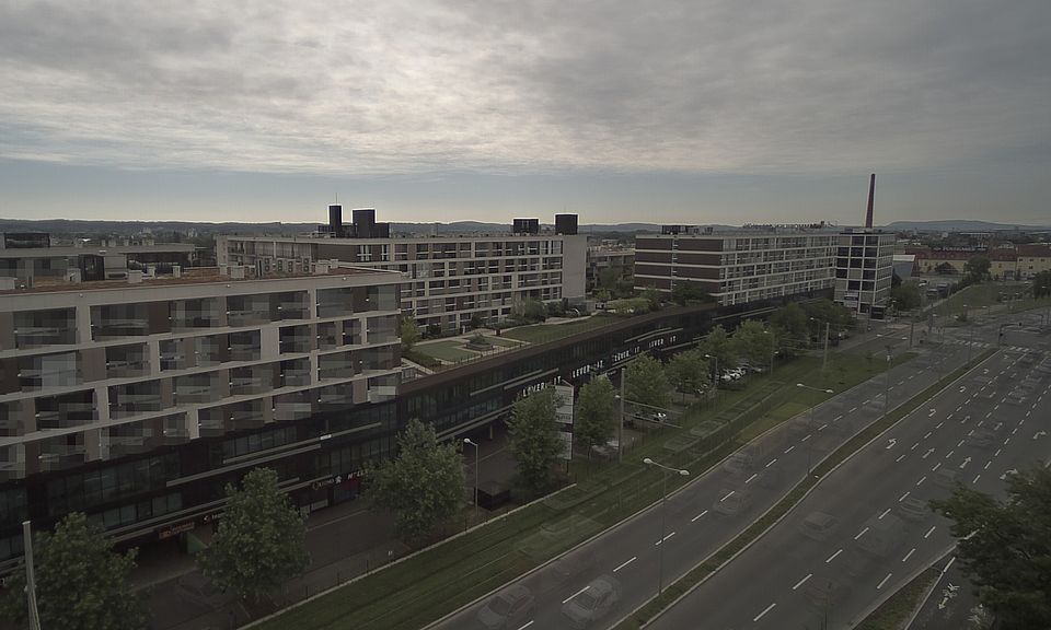 Livebild Baukamera 2 - Webcam 'Gesamtansicht Südwest' - Baustelle Stadtteil Brauquartier, Graz-Puntigam (ca. 5 Minuteninterval)