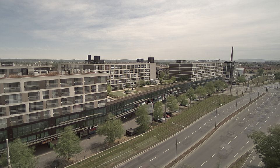 Livebild Baukamera 2 - Webcam 'Gesamtansicht Südwest' - Baustelle Stadtteil Brauquartier, Graz-Puntigam (ca. 5 Minuteninterval)
